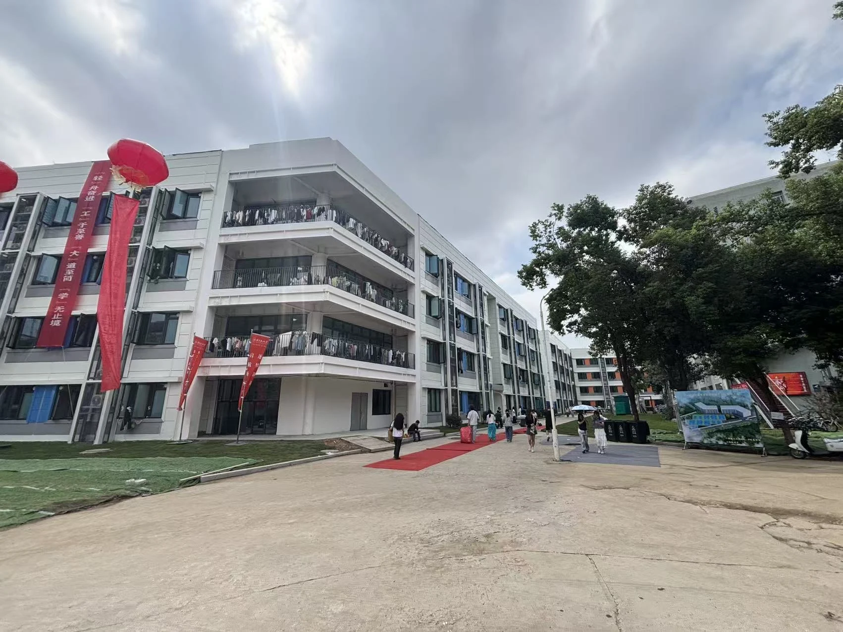 Completed student residence with balconies and entrance courtyard